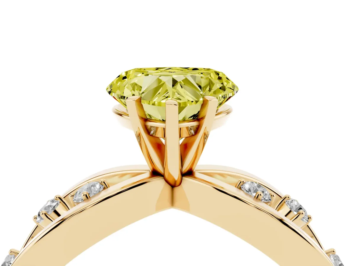 Fancy Yellow Heart Cut Cut Solitaire Diamond with Side Stones on Criss-Cross Band and Four-Prong Setting Yellow gold