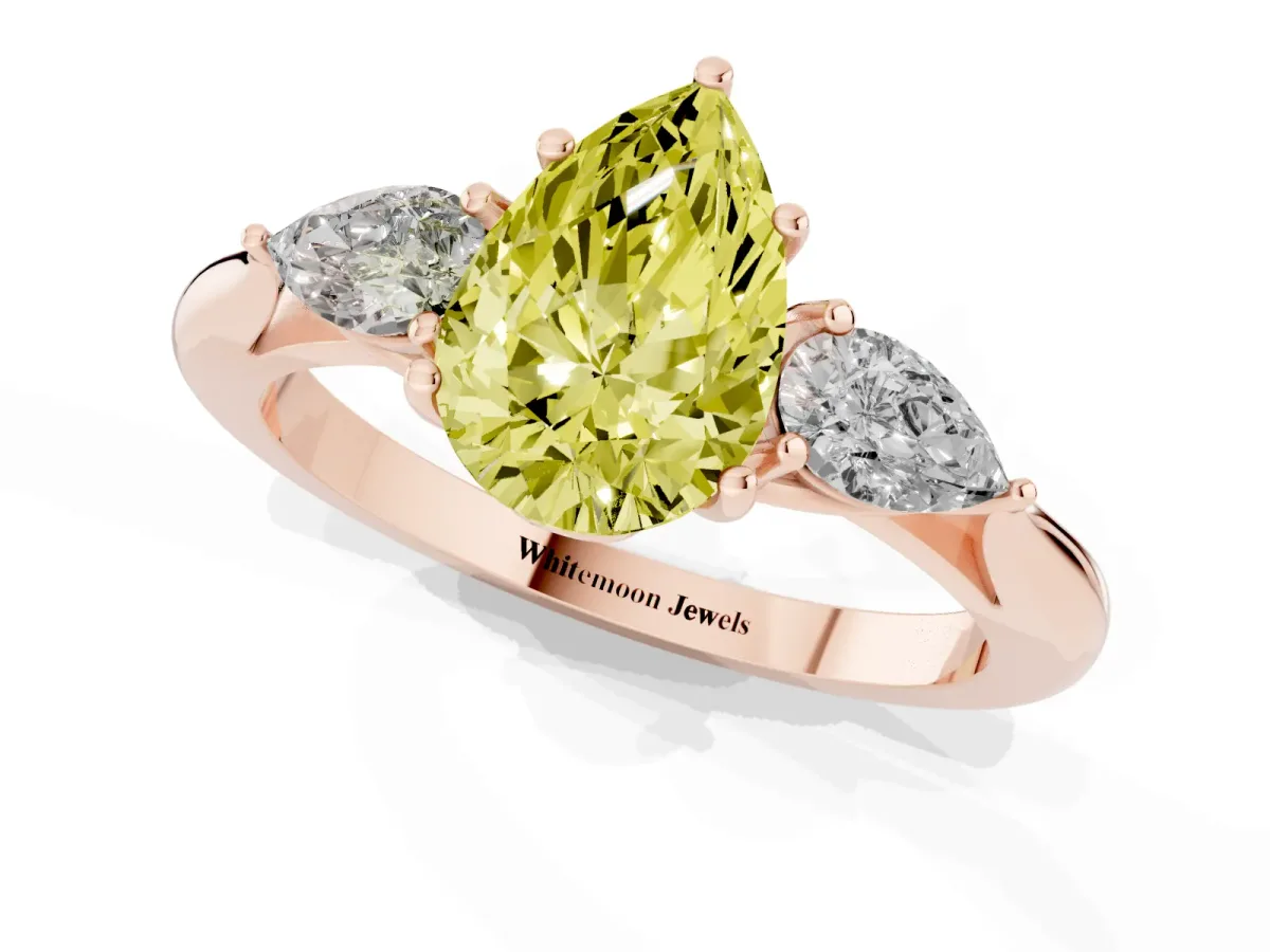 Fancy Yellow Pear Cut Diamond Three-Stone Ring with Pear Side Stones and Prong Setting Rose gold
