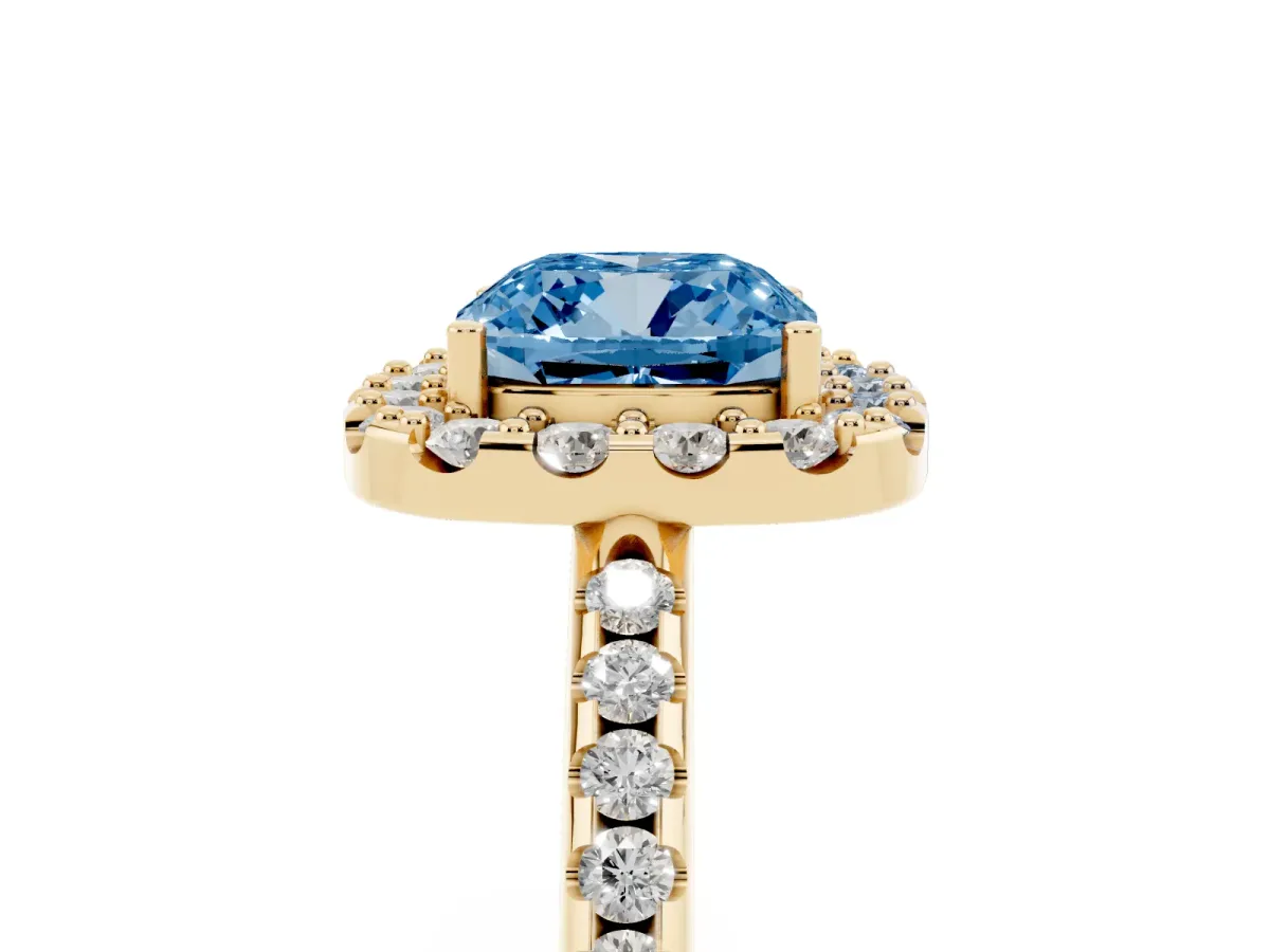 Fancy Blue Cushion Cut Diamond Pavé Halo Ring with Four-Prong Setting Yellow gold