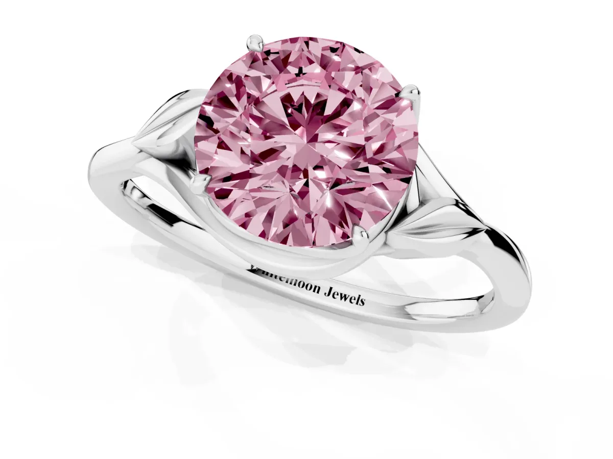 Fancy Pink Round Cut Diamond Solitaire Ring with Twist Band and Four-Prong Setting Silver