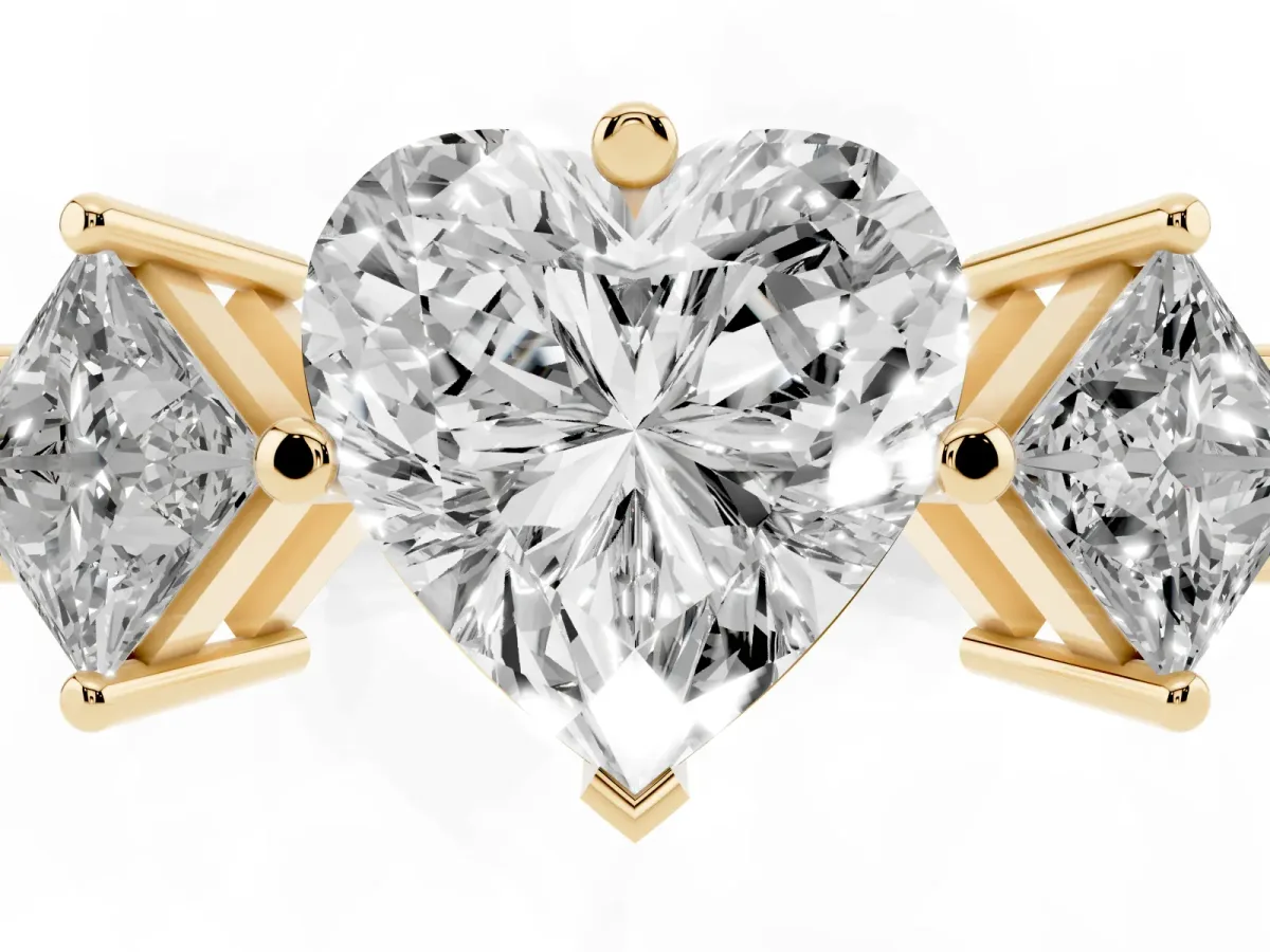 Three-Stone Heart Cut and Princess Cut Diamond Ring with Channel Band and Four-Prong Setting Yellow gold
