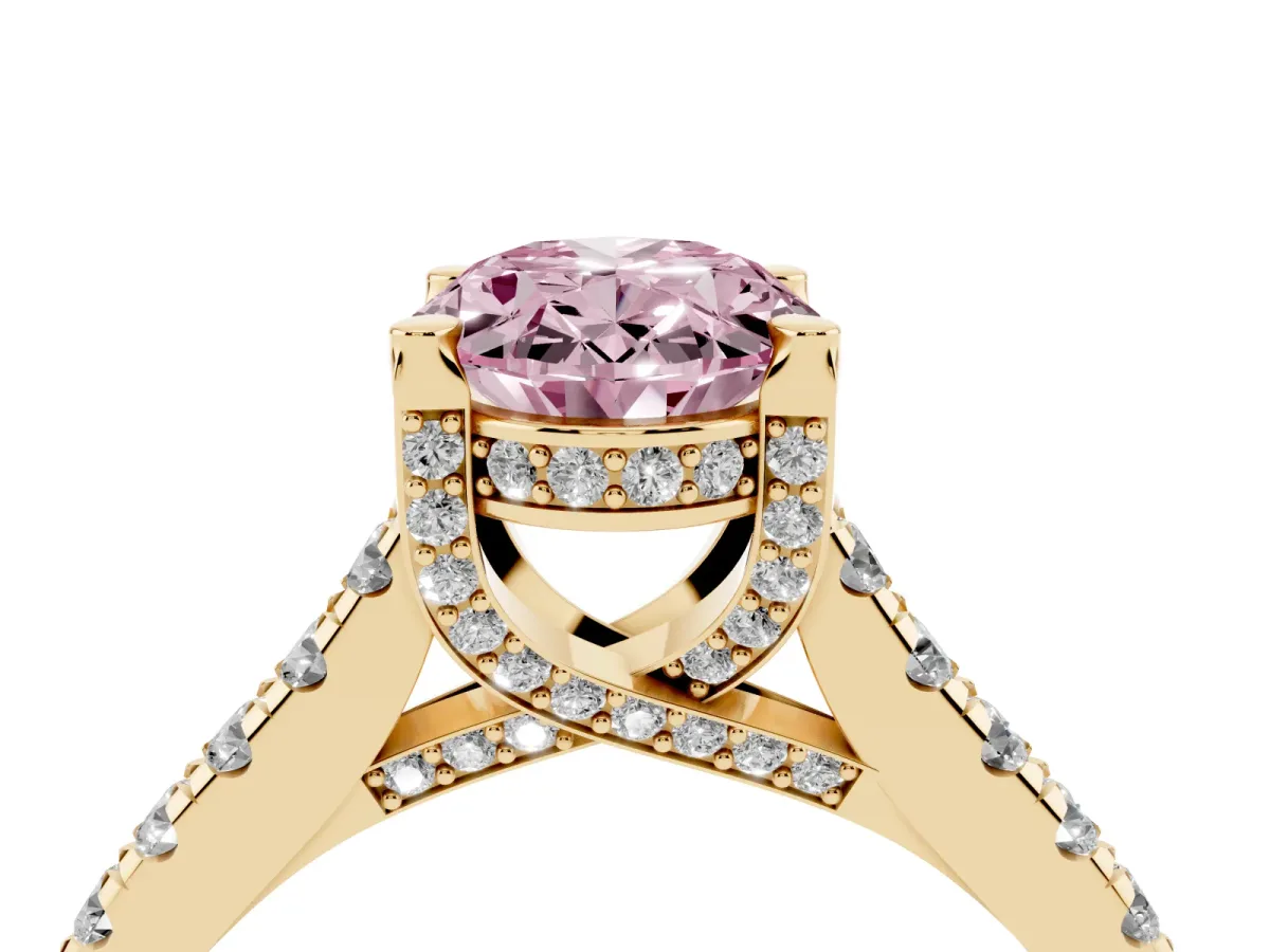 Fancy Pink Oval Cut Brilliant Diamond Solitaire with Pavé Band and Four-Prong Setting Yellow gold