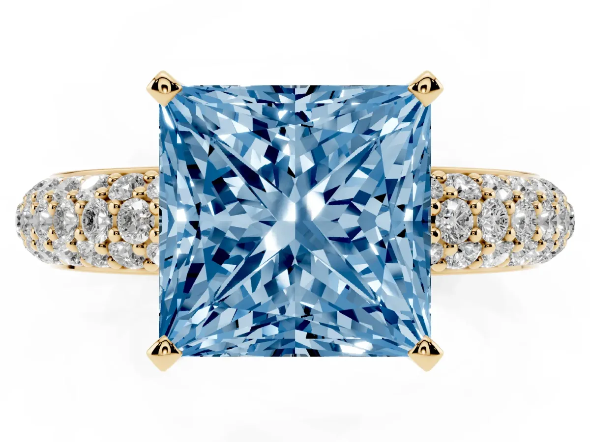 Fancy Blue Princess Cut Diamond Solitaire Ring with Prong Setting and Pavé Band Yellow gold