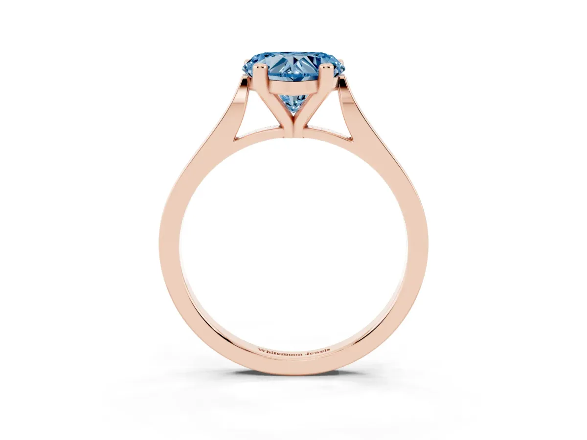 Fancy Blue Heart Cut Solitaire Diamond Ring with Four-Prong Setting and Tapered Band Rose gold