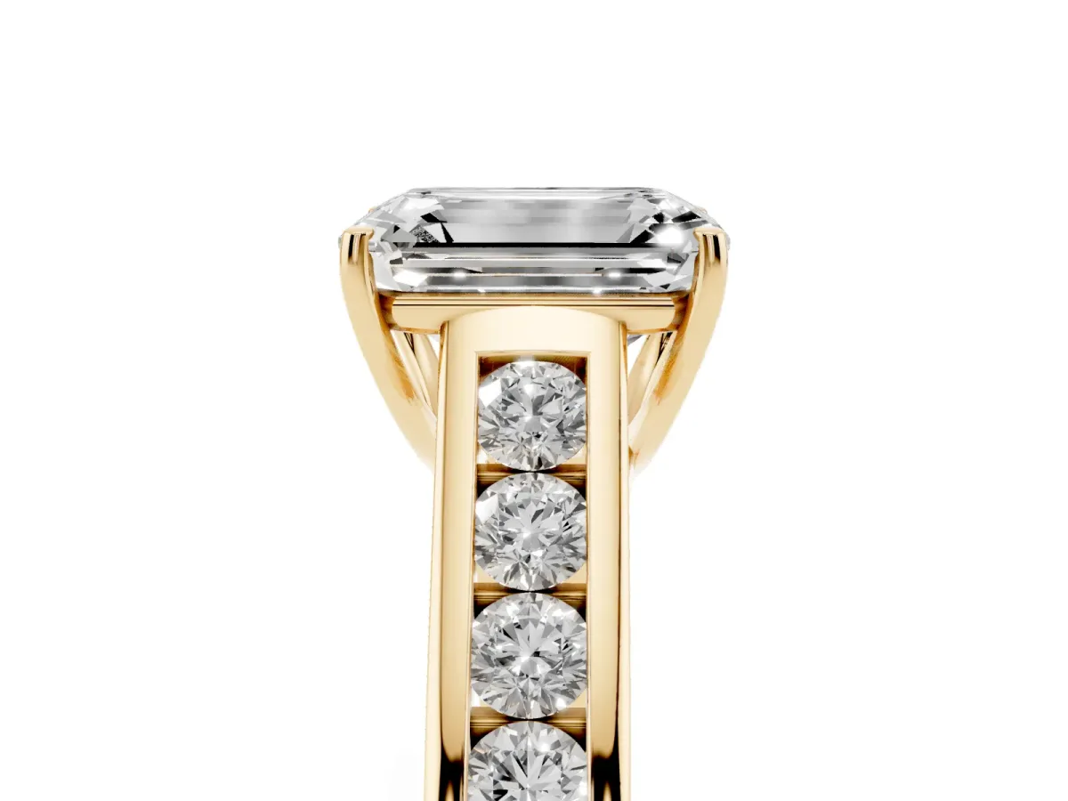 Emerald Cut Solitaire Channel-Set Diamond Engagement Ring with Four-Prong Setting Yellow gold