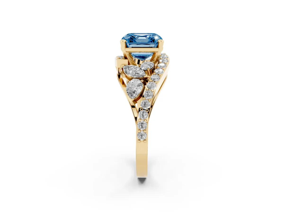 Fancy Blue Asscher Cut Diamond Halo Ring with Marquise and Pavé Band in Prong Setting Yellow gold