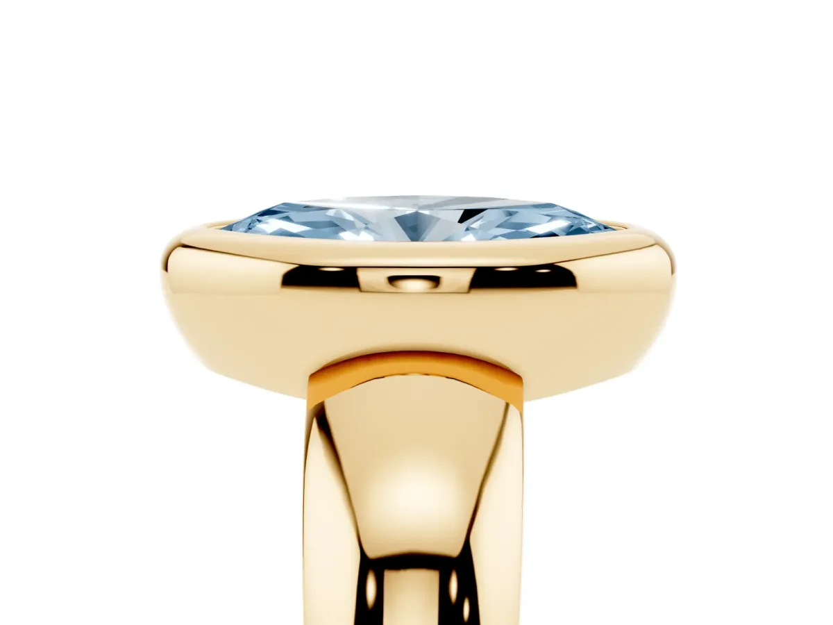 Fancy Blue Bezel Set Marquise Cut Solitaire Ring with Wide Band Yellow gold