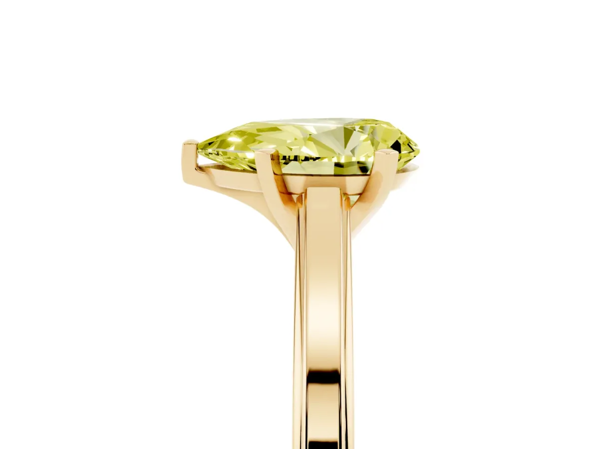 Fancy Yellow Pear Cut Solitaire Diamond Ring with Four-Prong Setting and Classic Band Yellow gold