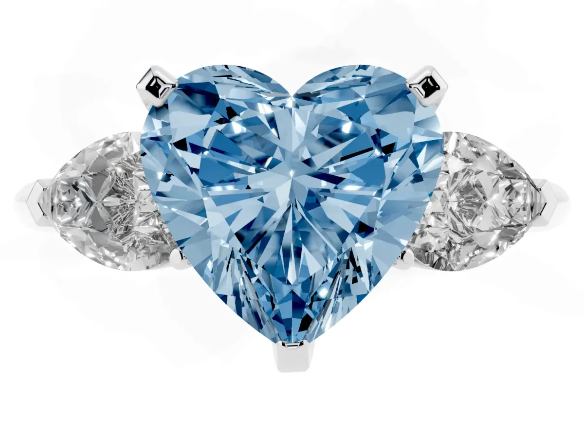 Fancy Blue Three-Stone Heart Cut Diamond Ring with Pear Side Stones and Four-Prong Setting Silver