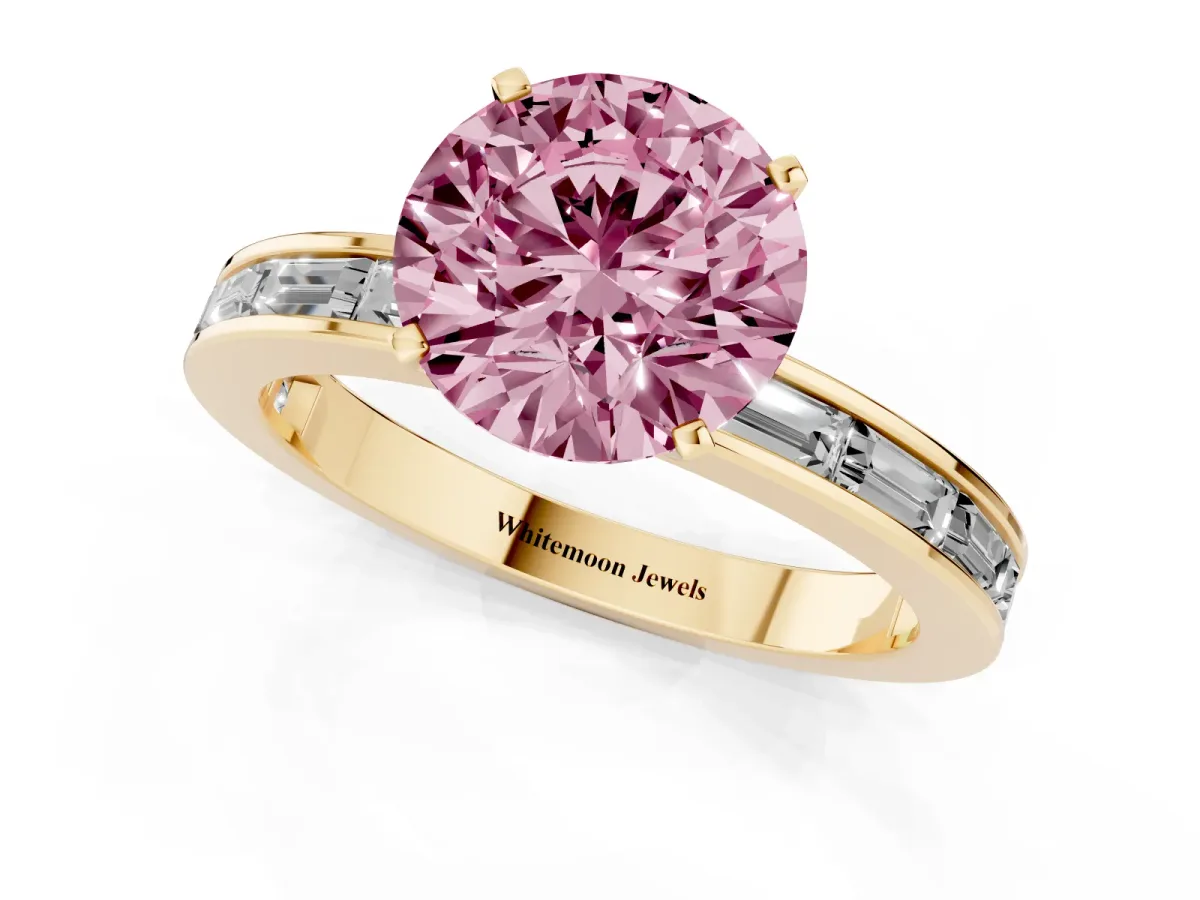 Fancy Pink Round Cut Solitaire Diamond Ring with Channel-Set Baguette Band and Four-Prong Setting Yellow gold