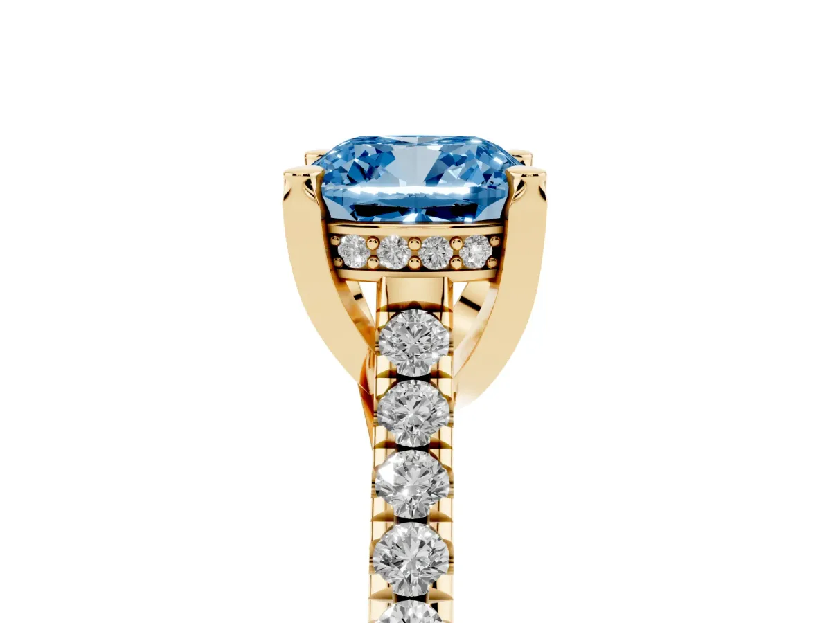 Fancy Blue Cushion Cut Brilliant Diamond Solitaire with Pavé Band and Four-Prong Setting Yellow gold