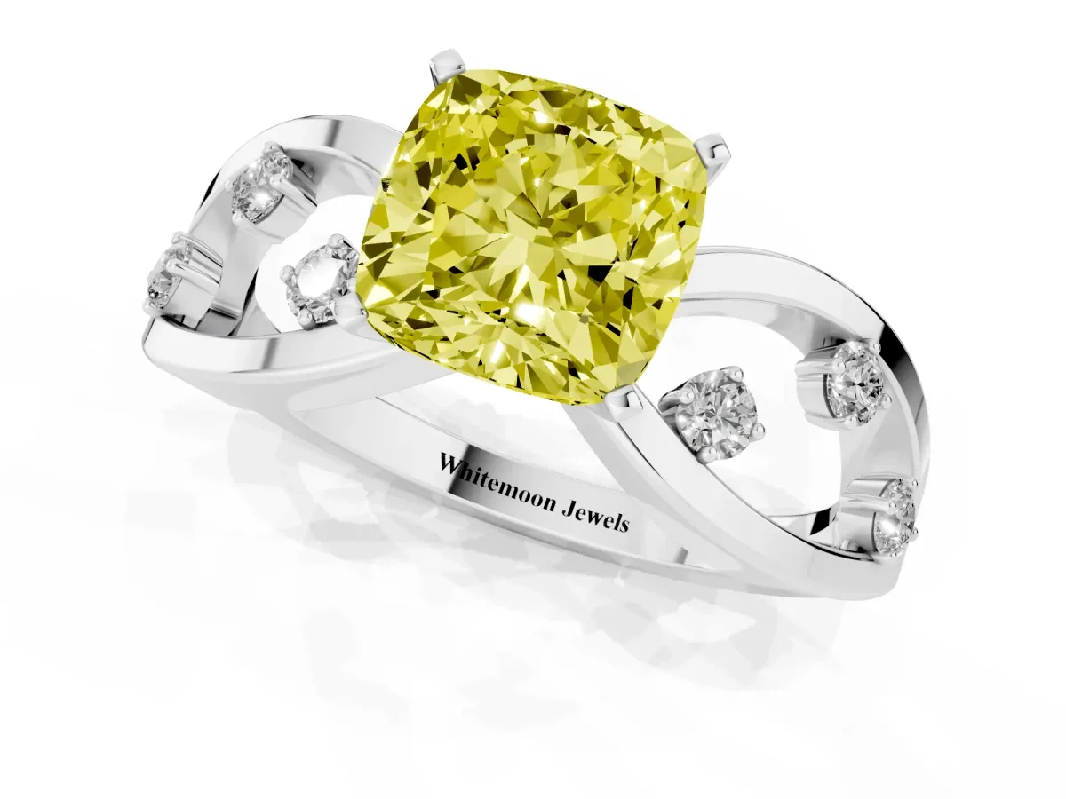 Fancy Yellow Cushion Cut Cut Solitaire Diamond with Side Stones on Criss-Cross Band and Four-Prong Setting Silver