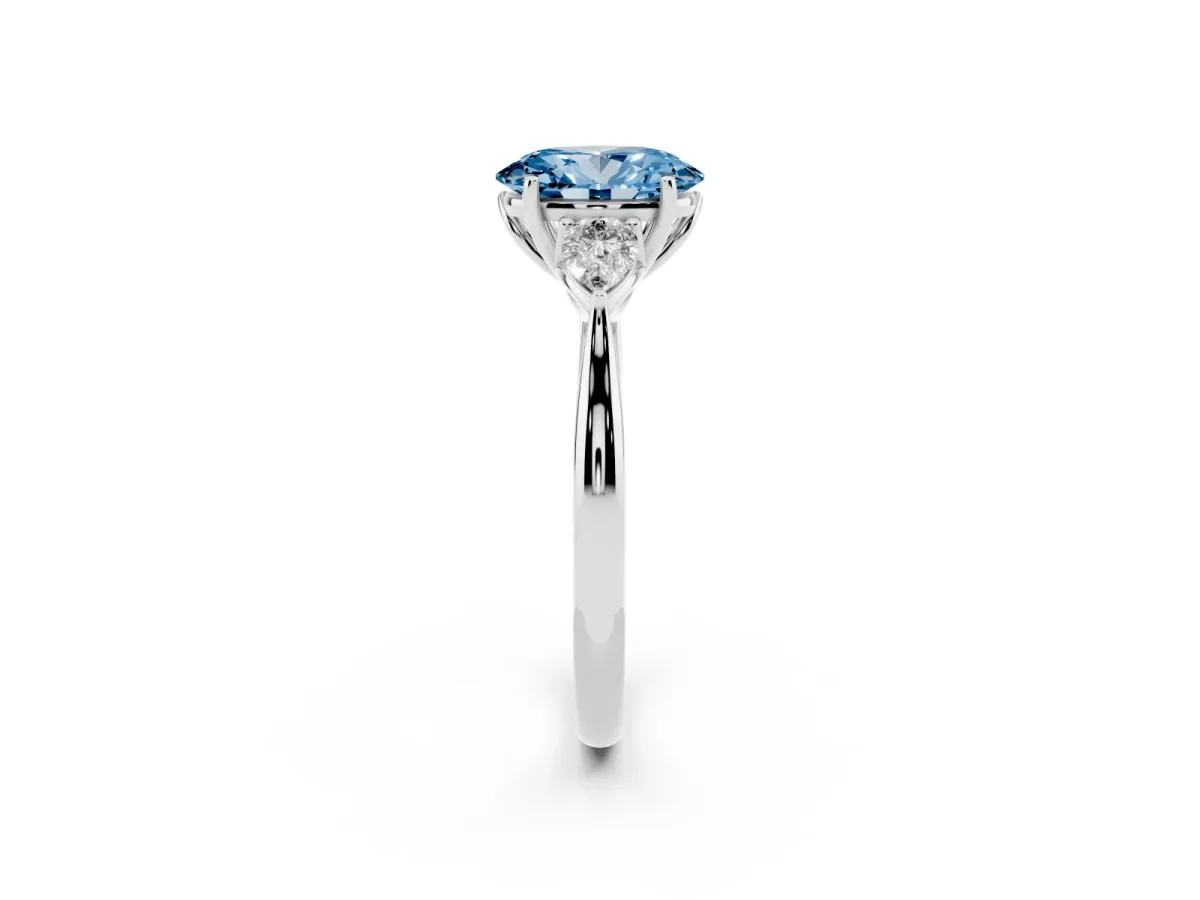 Fancy Blue Oval Cut Diamond Three-Stone Ring with Pear Side Stones and Prong Setting White gold