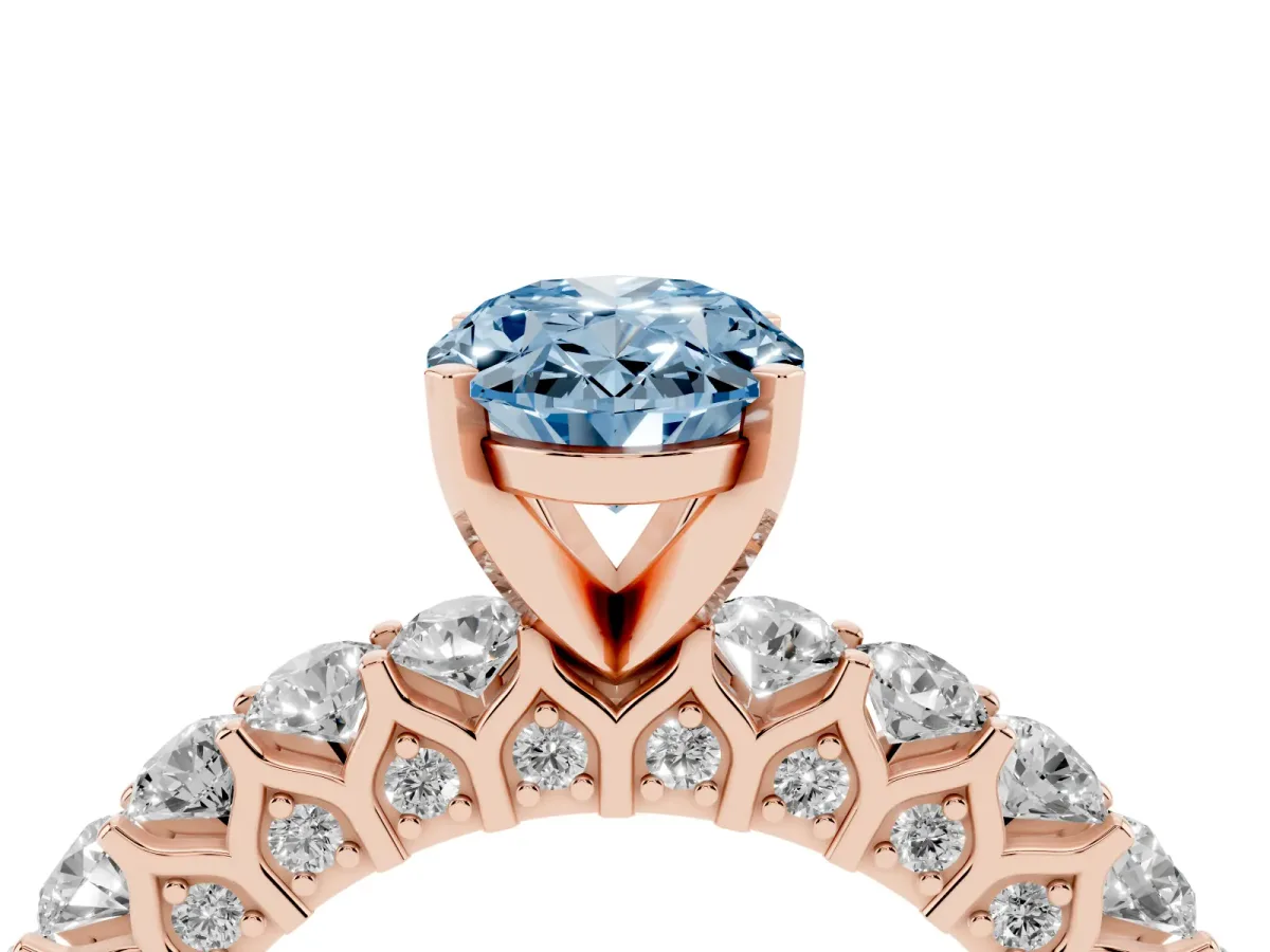 Fancy Blue Oval Cut Diamond Solitaire Ring with Shared Prong Pavé Band and Four-Prong Setting Rose gold