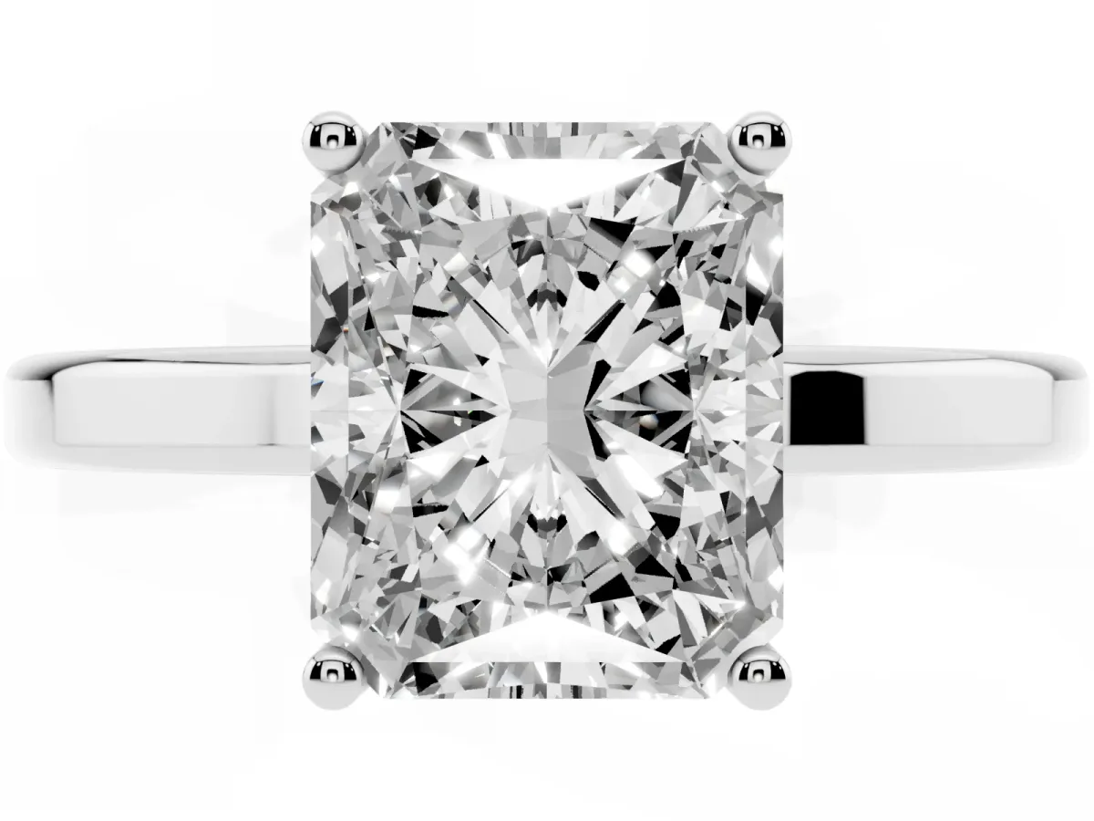 Radiant Cut Cut Solitaire Engagement Ring with Four-Prong Setting on a Classic Band Silver