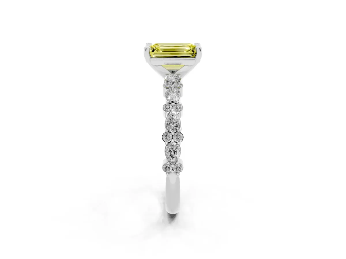 Fancy Yellow Emerald Cut Diamond Side Stone Solitaire Ring with Round and Four-Prong Setting Platinum