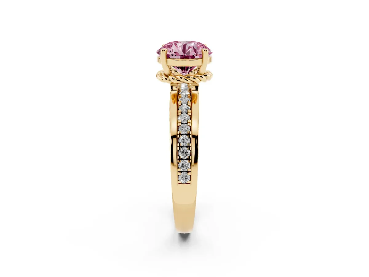 Fancy Pink Round Cut Solitaire Diamond Ring with Channel Set Band and Six-Prong Setting Yellow gold