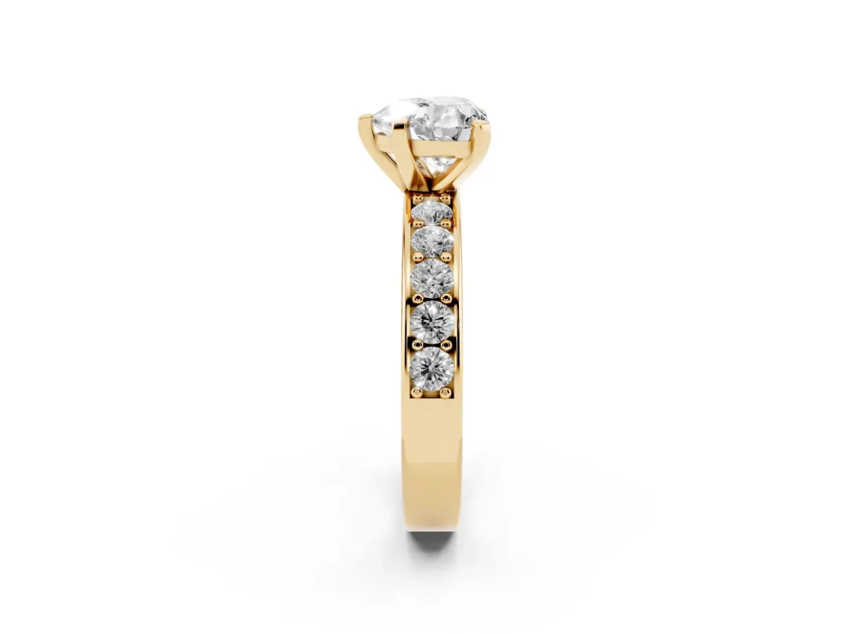 Heart Cut Diamond Engagement Ring with Channel Set Round Band and Prong Setting Yellow gold