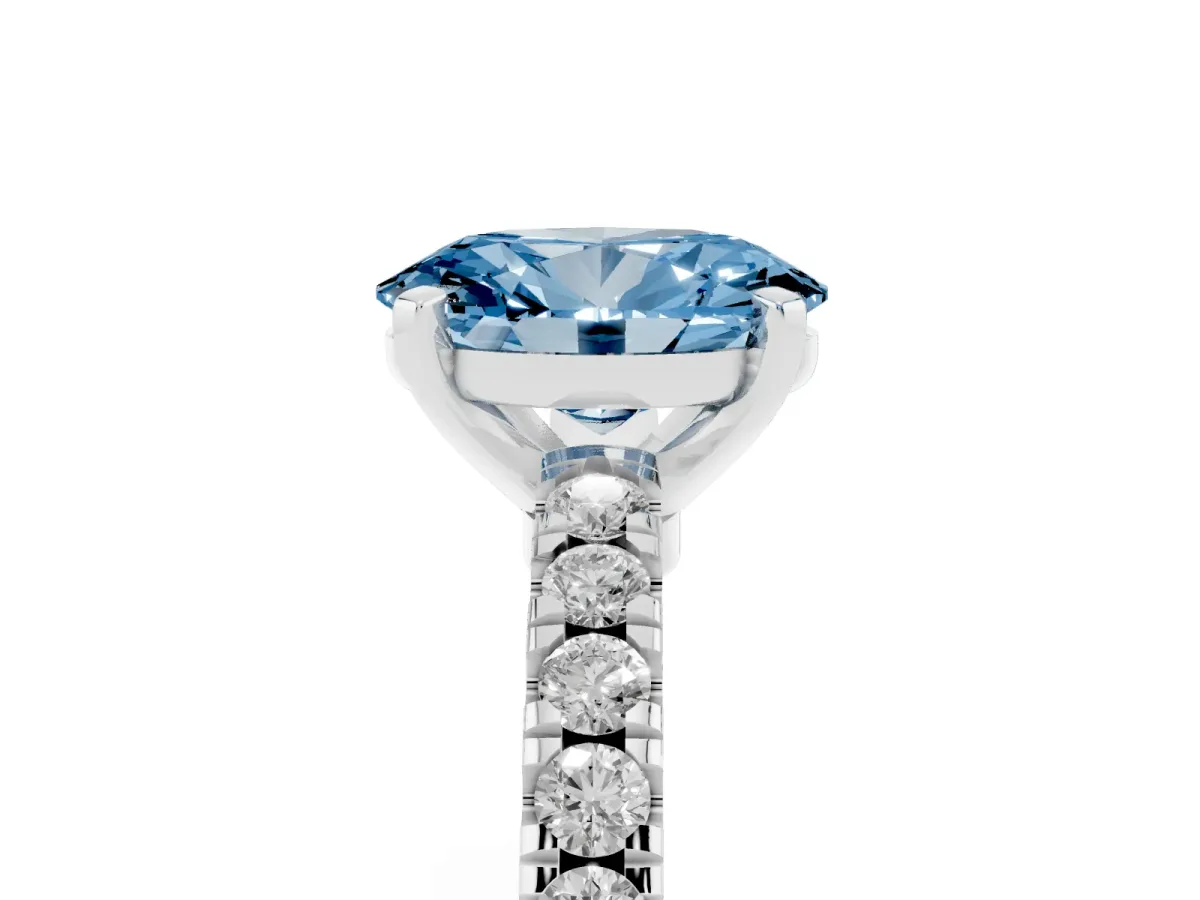 Fancy Blue Oval Cut Solitaire Diamond with Pavé Band and Four-Prong Setting Silver
