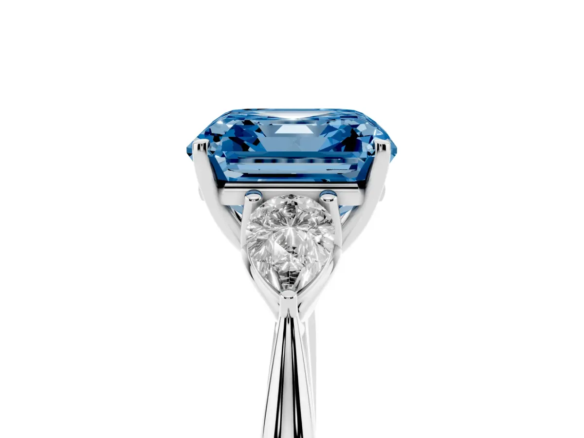 Fancy Blue Three-Stone Asscher Cut Diamond Ring with Pear Side Stones in Four-Prong Setting Silver