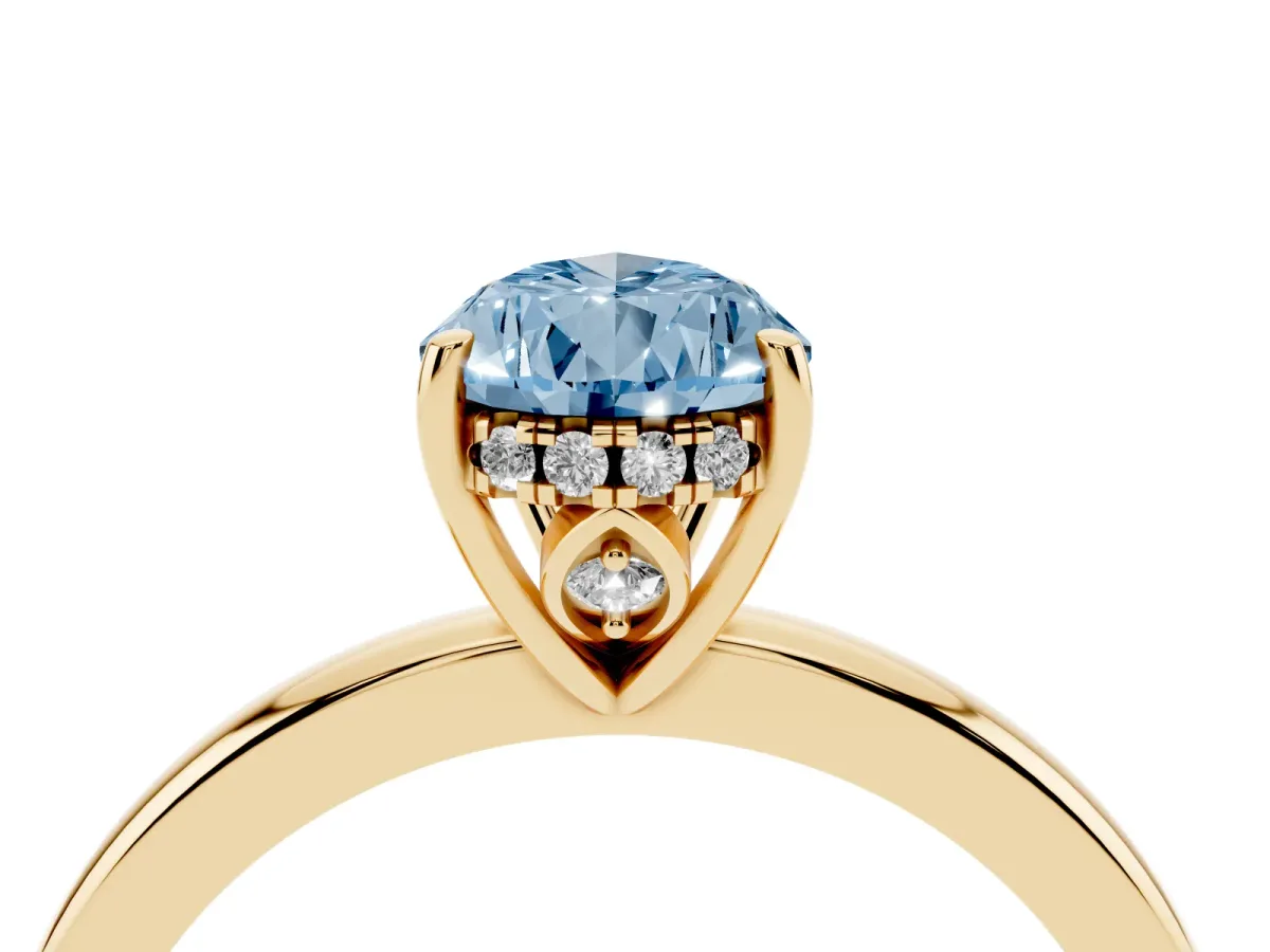 Fancy Blue Pear Cut Solitaire Diamond Ring with Prong Setting and Plain Band Yellow gold