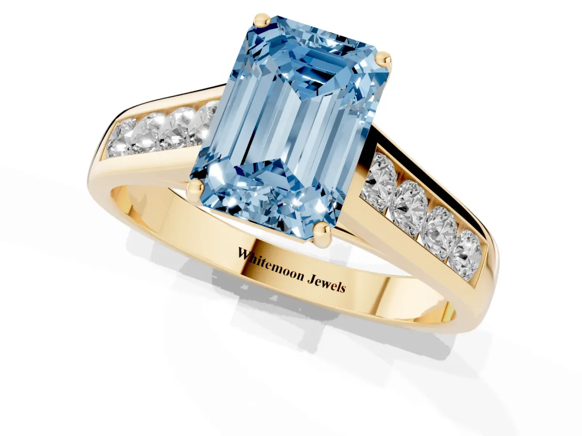 Fancy Blue Emerald Cut Solitaire Channel-Set Diamond Engagement Ring with Four-Prong Setting Yellow gold