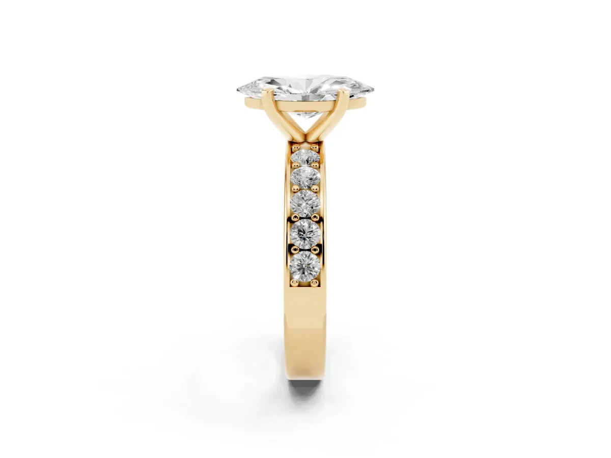 Marquise Cut Diamond Engagement Ring with Channel Set Round Band and Prong Setting Yellow gold