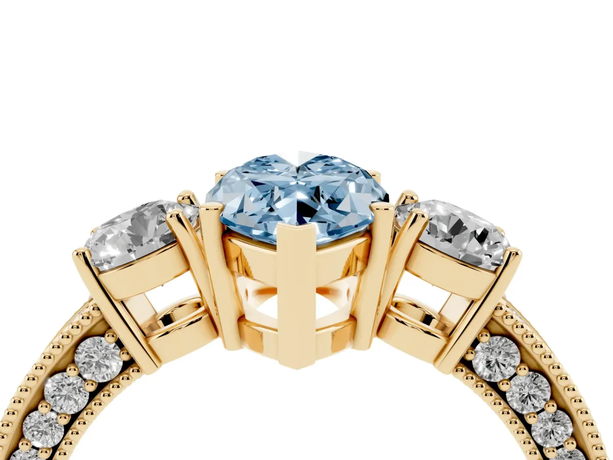 Fancy Blue Marquise Cut Three-Stone Diamond Ring with Pavé Band and Four-Prong Setting Yellow gold