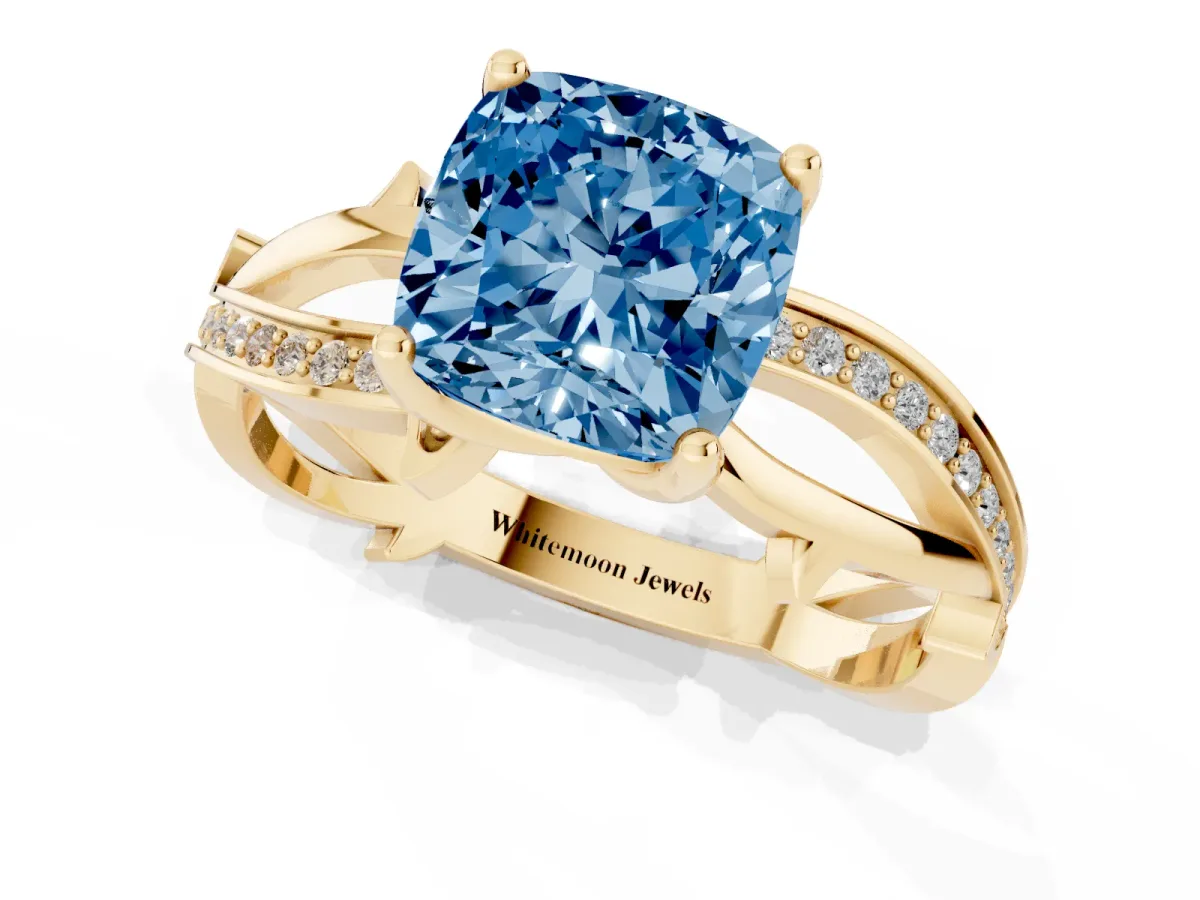 Fancy Blue Cushion Cut Solitaire Twist Band with Pavé Accents and Four-Prong Setting Yellow gold