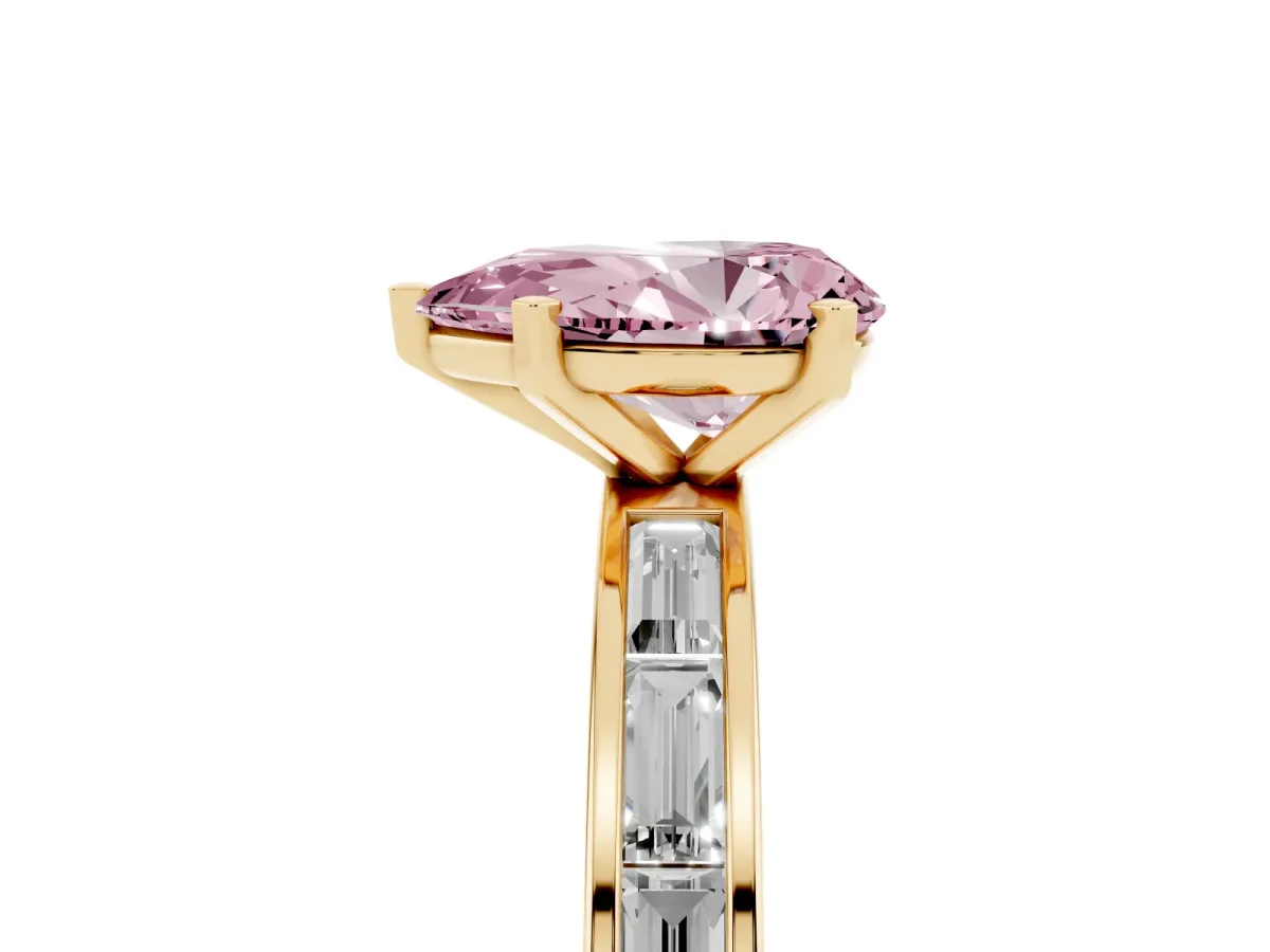 Fancy Pink Pear Cut Solitaire Diamond Ring with Channel-Set Baguette Band and Four-Prong Setting Yellow gold