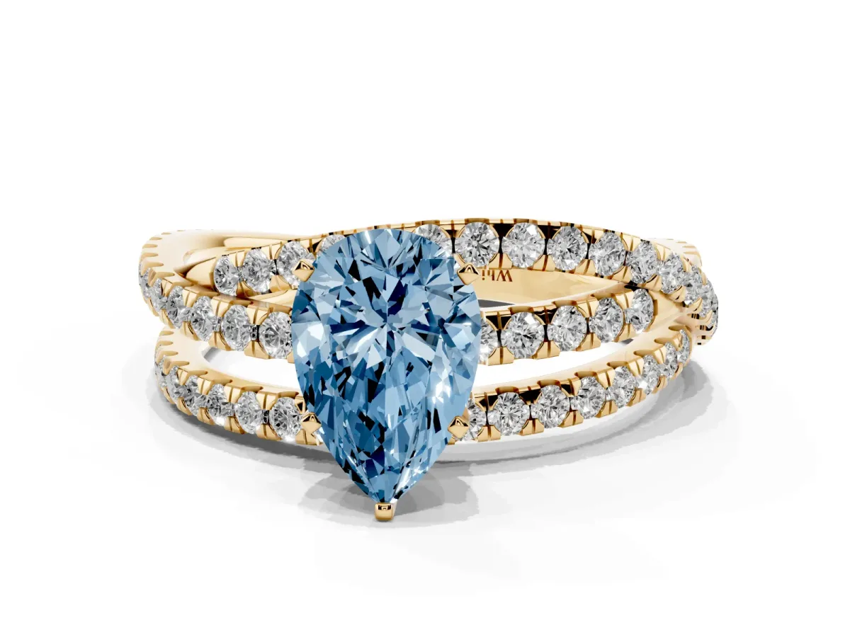 Fancy Blue Pear Cut Solitaire Twist Band with Pavé Setting and Four-Prong Setting Yellow gold
