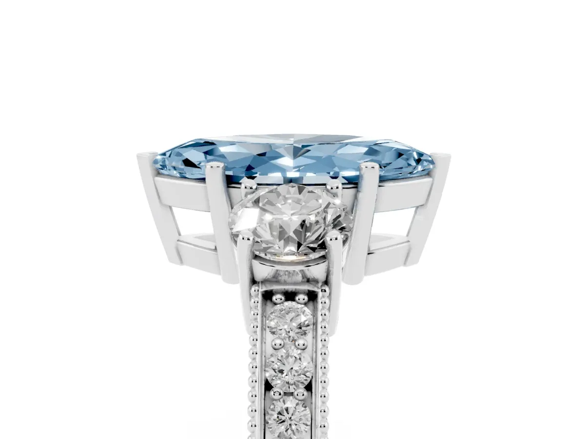 Fancy Blue Marquise Cut Three-Stone Diamond Ring with Pavé Band and Four-Prong Setting Silver