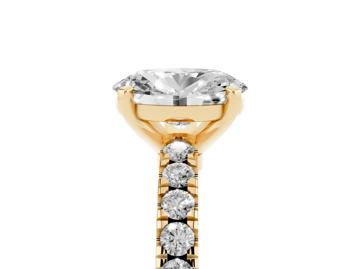 Oval Cut Solitaire Diamond with Pavé Band and Four-Prong Setting Yellow gold