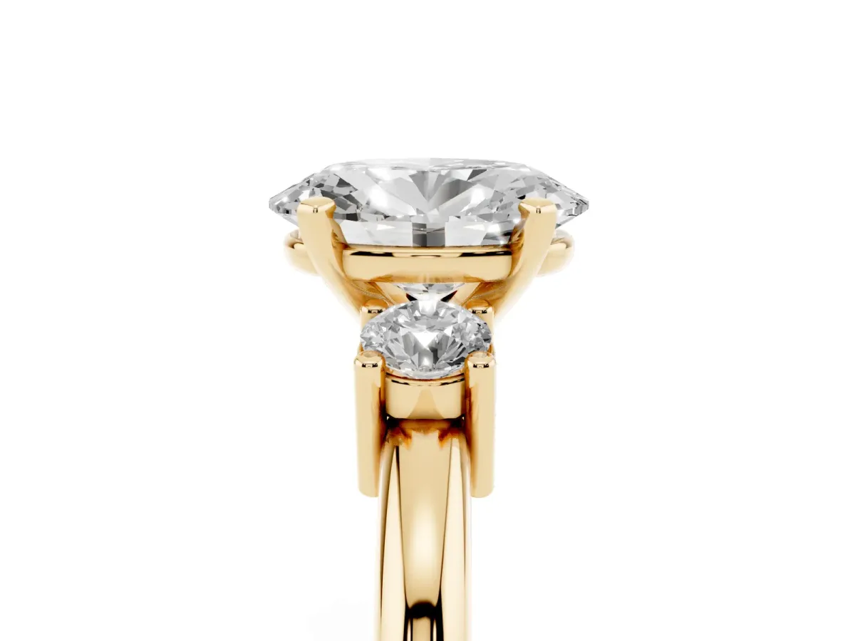 Three-Stone Oval Cut Cut Diamond Solitaire with Prong Setting and Classic Band Yellow gold