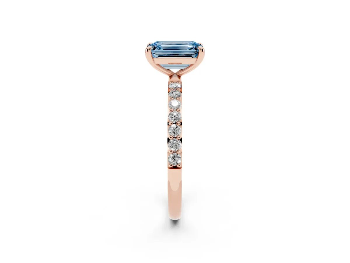 Fancy Blue Emerald Cut Diamond Solitaire Ring with Round Pavé Band and Prong Setting Rose gold