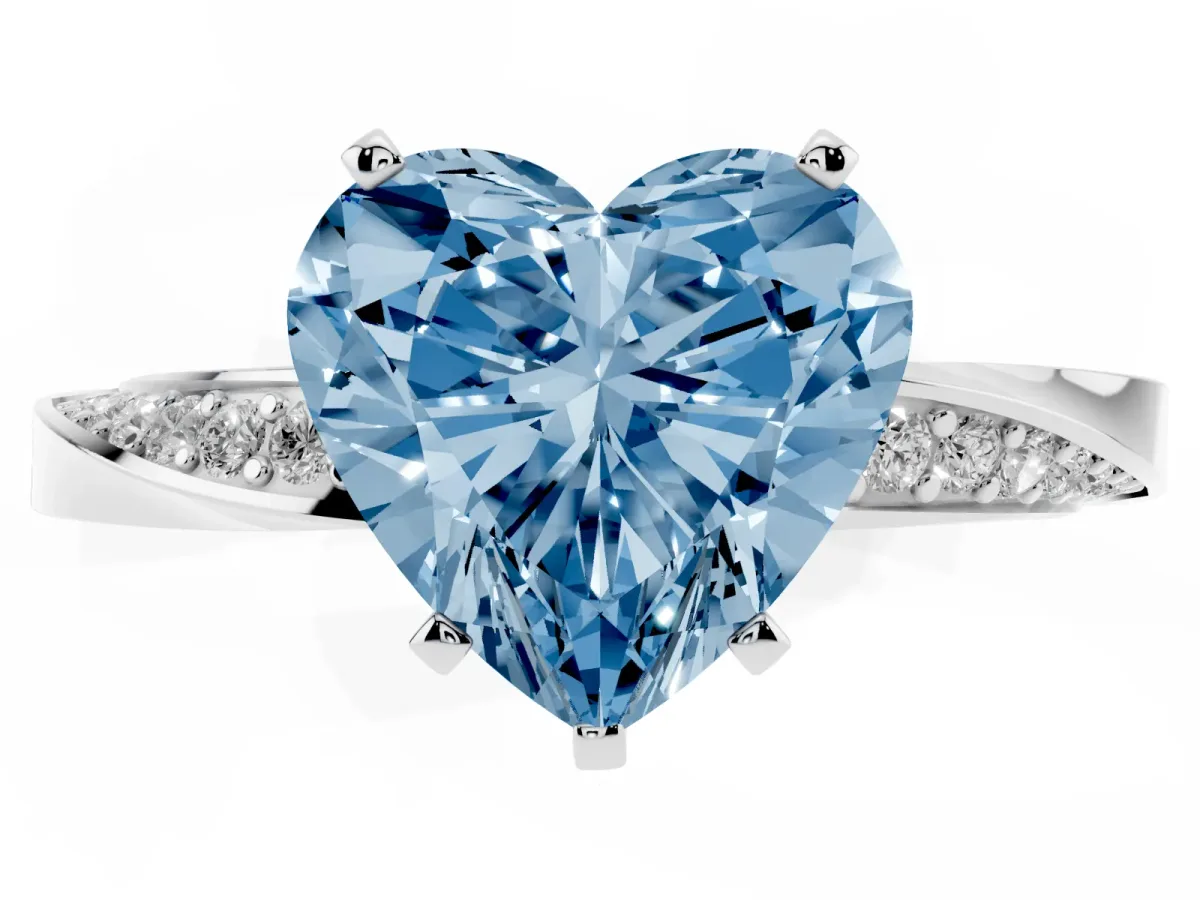Fancy Blue Heart Cut Diamond Engagement Ring with Side Stone Accents and Four-Prong Setting Silver