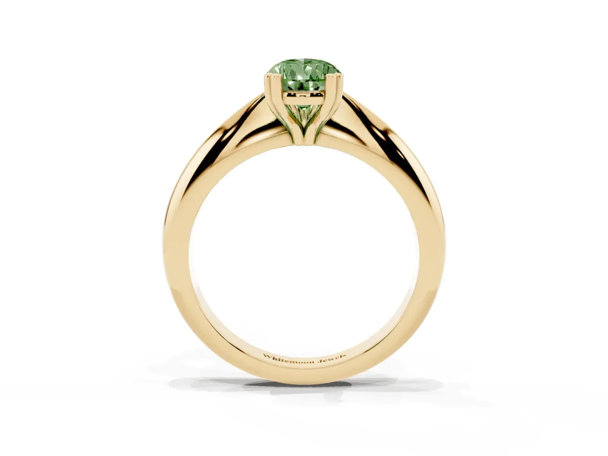 Fancy Green Pear Cut Cut Solitaire Engagement Ring with Tapered Band and Four-Prong Setting Yellow gold