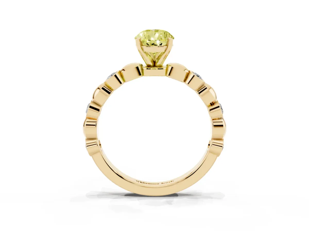 Fancy Yellow Pear Cut Solitaire Bezel-Set Diamond Ring with Beaded Band and Four-Prong Setting Yellow gold