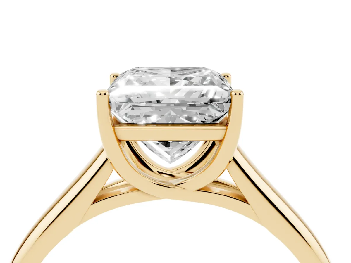 Princess Cut Solitaire Engagement Ring with Tapered Band and Four-Prong Setting Yellow gold