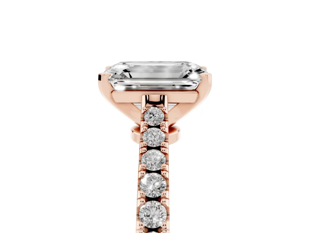 Emerald Cut Cut Solitaire Diamond Engagement Ring with Pave Band and Four-Prong Setting Rose gold