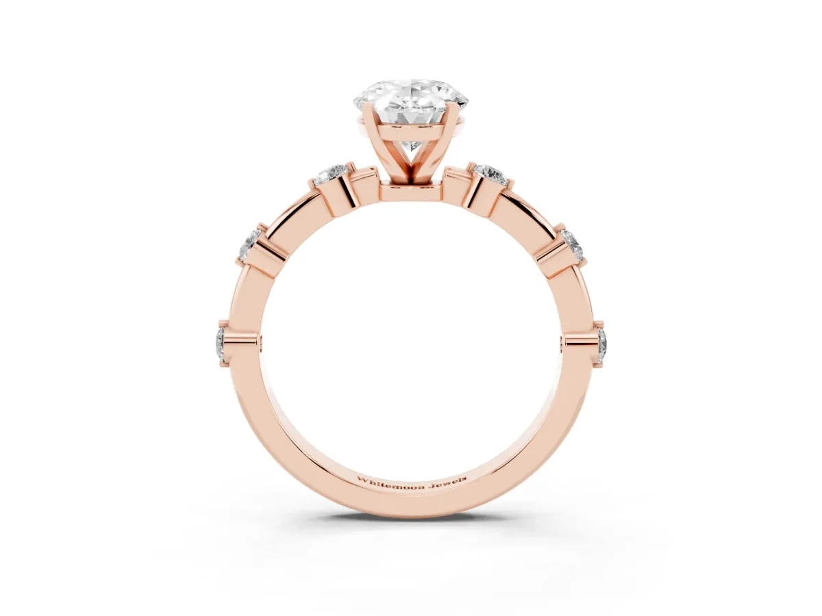 Oval Cut Solitaire Diamond Ring with Bezel Set Side Stones and Prong Setting Rose gold