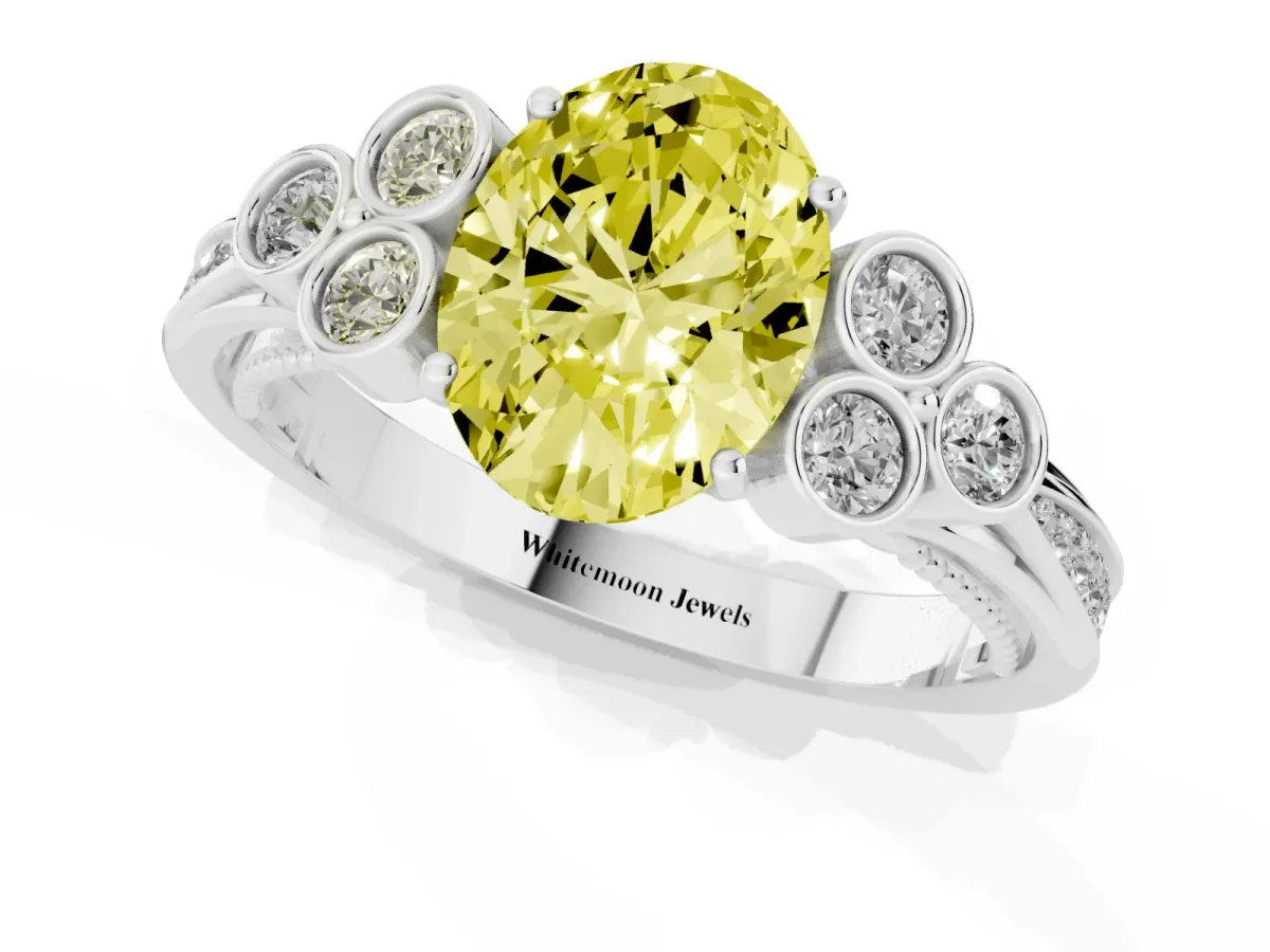 Fancy Yellow Oval Cut Cut Diamond Engagement Ring with Bezel Set Round Side Stones and Prong Setting Silver