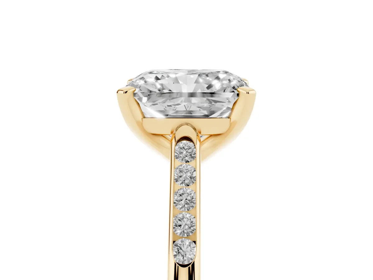 Radiant Cut Diamond Solitaire Ring with Channel Set Round Band and Prong Setting Yellow gold