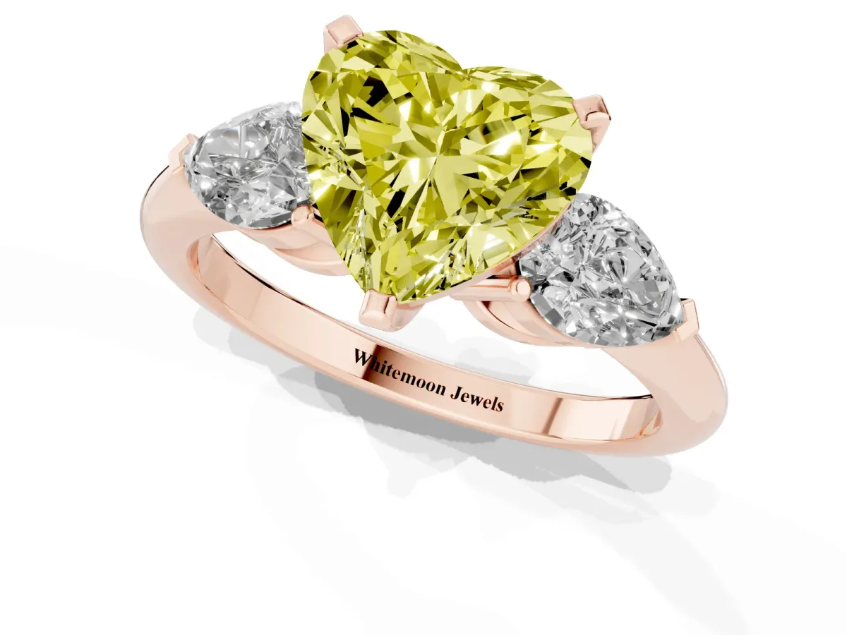 Fancy Yellow Three-Stone Heart Cut Diamond Ring with Pear Side Stones and Four-Prong Setting Rose gold