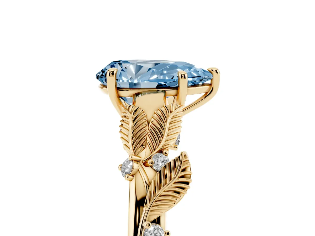 Fancy Blue Pear Cut Diamond Solitaire Ring with Leaf Motif Band and Four-Prong Setting Yellow gold