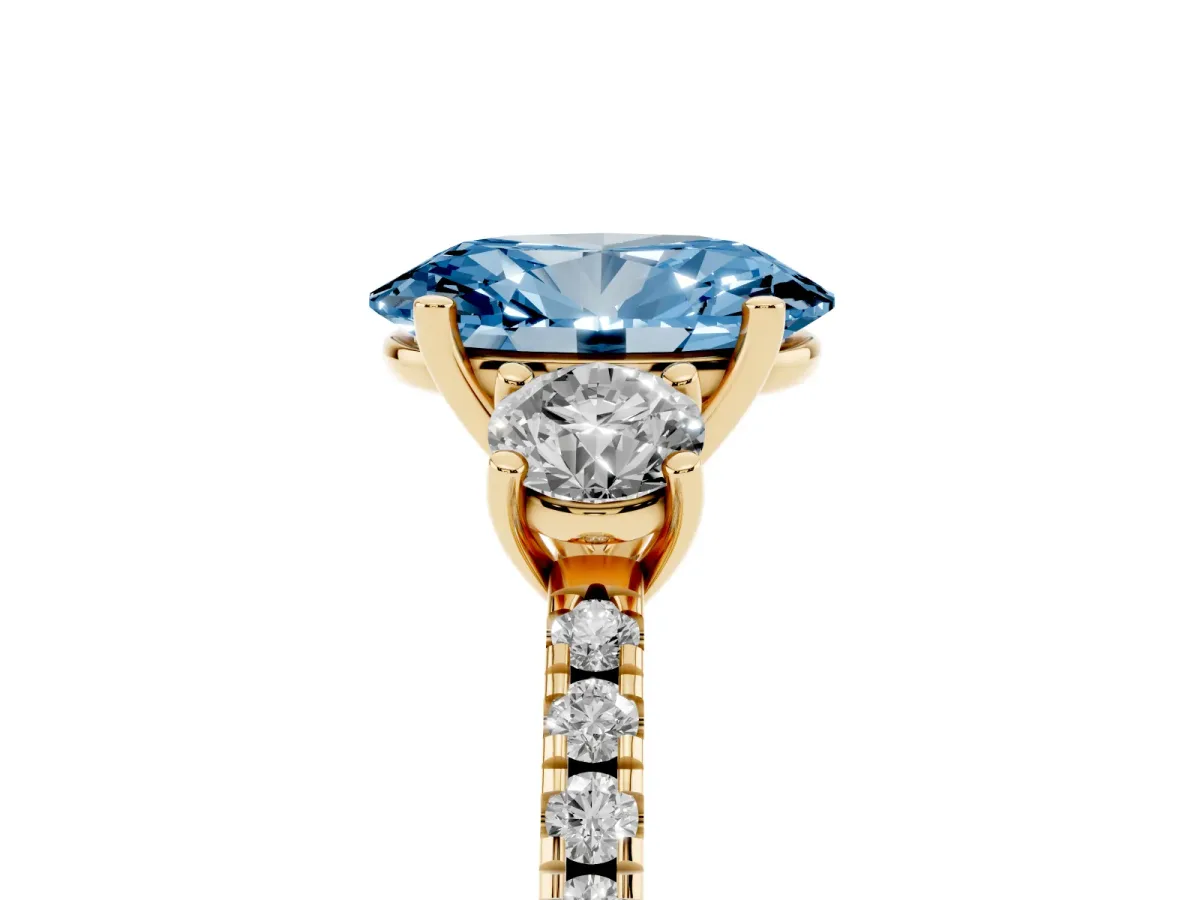 Fancy Blue Three-Stone Oval Cut Cut Diamond Pavé Band with Prong Setting Yellow gold