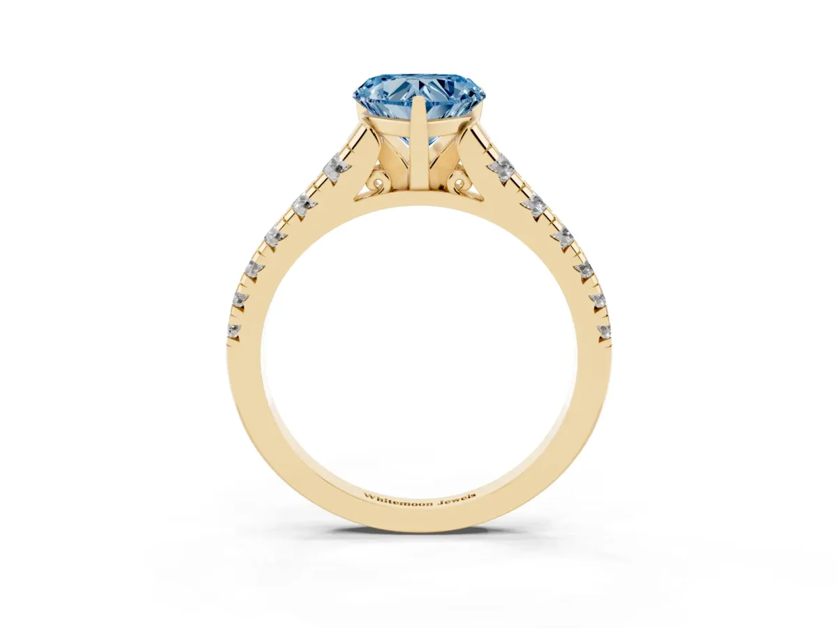 Fancy Blue Heart Cut Diamond Cathedral Solitaire Ring with Round Pavé Band Yellow gold
