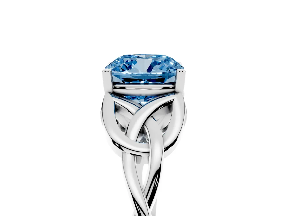 Fancy Blue Cushion Cut Diamond Solitaire Engagement Ring with Celtic Knot Band and Four-Prong Setting Silver