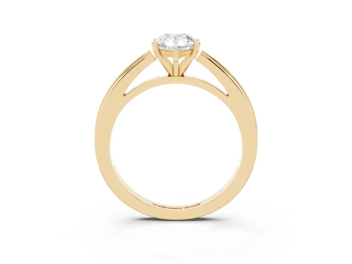 Pear Cut Solitaire Diamond Ring with Four-Prong Setting and Classic Band Yellow gold