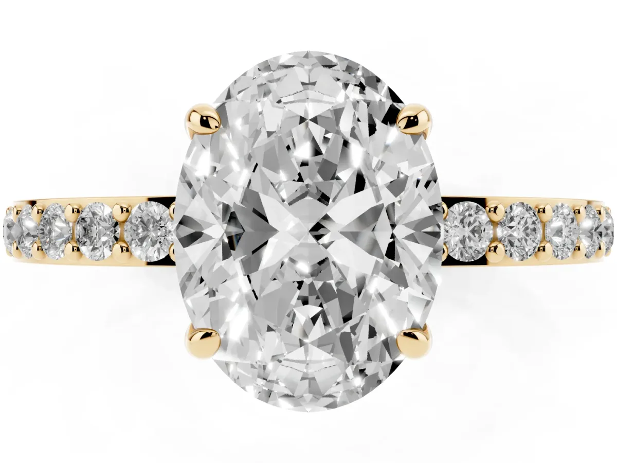 Oval Cut Diamond Pavé Engagement Ring with Round Accents and Prong Setting Yellow gold